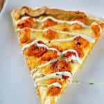 A Slice of Chicken Wing Pizza ( Hot Wings & Blue Cheese Base )